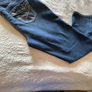 Cato dark wash jeans 18w. Lower waist. Zipper and button.